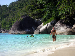 Visitor walks on white sandy beach during Similan Island Speedboat Day Tours Trips