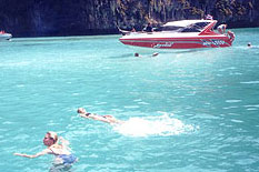 Phuket Private Speedboat with photo of guest enjoy snorkeling
