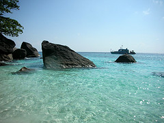 Rock formation situated on beach during Surin Island Speedboat Tours